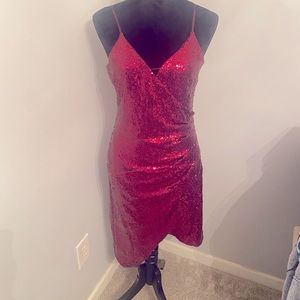 Beautiful cocktail dress. Maroon in color. Sequins, sequins and more sequins.